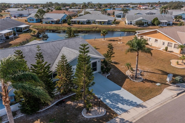 drone / aerial view featuring a water view