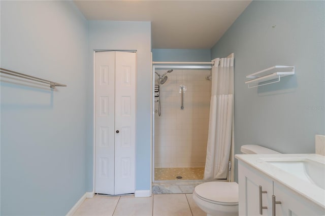 bathroom featuring tile patterned floors, vanity, toilet, and a shower with shower curtain