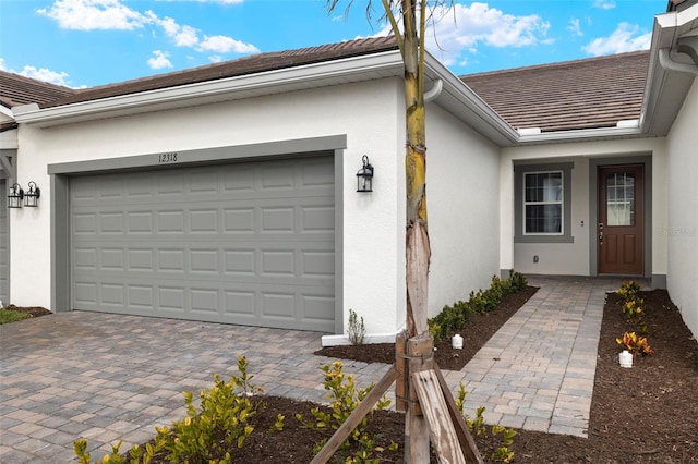 property entrance featuring a garage