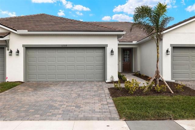 view of front of property with a garage