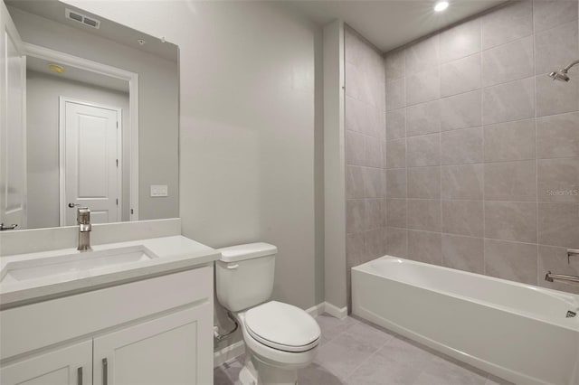 full bathroom with vanity, toilet, and tiled shower / bath