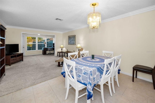 carpeted dining room featuring a textured ceiling, a notable chandelier, and crown molding