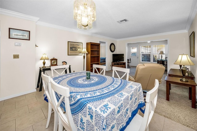 dining space featuring light tile patterned flooring, crown molding, and a textured ceiling