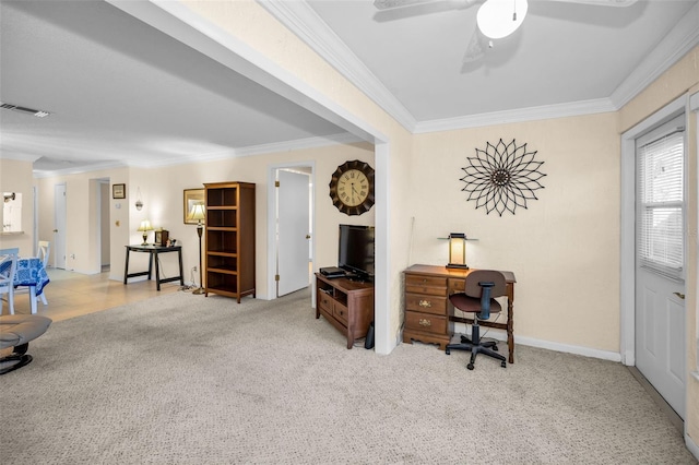 home office featuring light carpet, ceiling fan, and ornamental molding