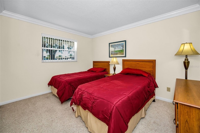 bedroom featuring crown molding and a textured ceiling