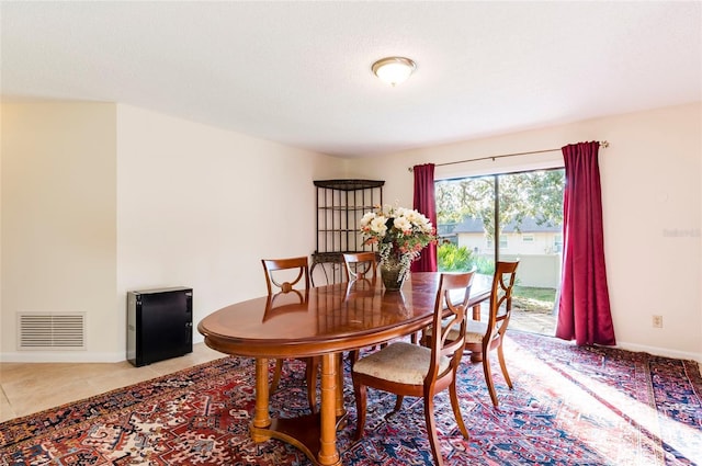 view of tiled dining space