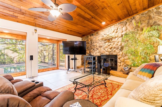 tiled living room featuring ceiling fan and wooden ceiling