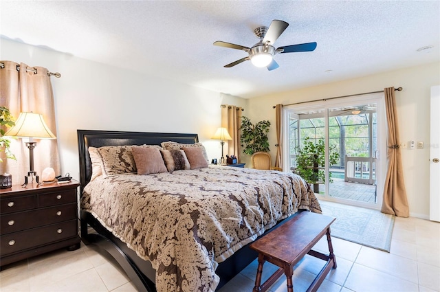 bedroom with ceiling fan, access to exterior, light tile patterned floors, and a textured ceiling