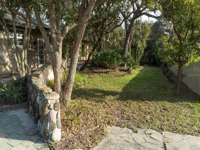 view of yard with fence