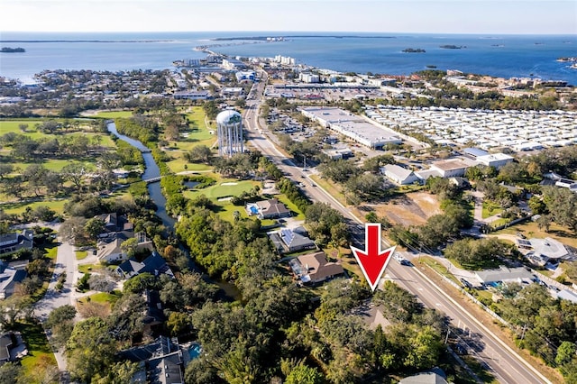 birds eye view of property featuring a water view