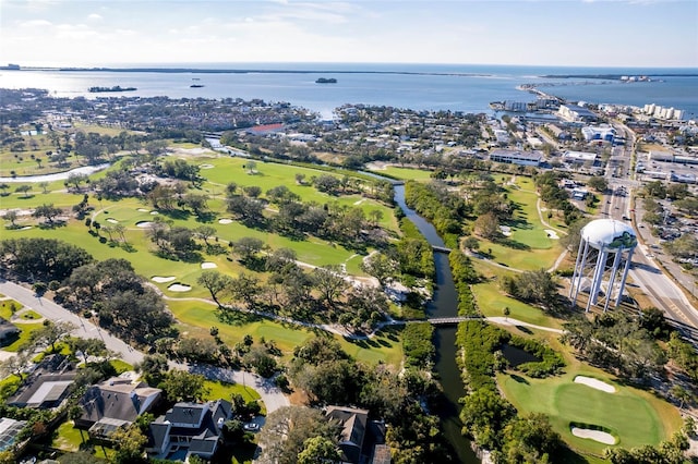 aerial view featuring golf course view and a water view