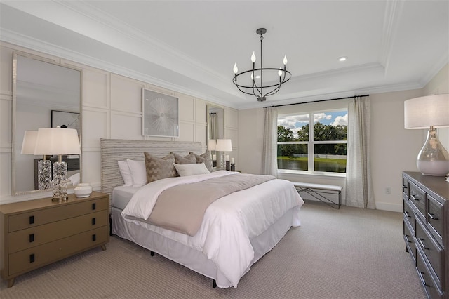 carpeted bedroom featuring a raised ceiling, crown molding, and a notable chandelier