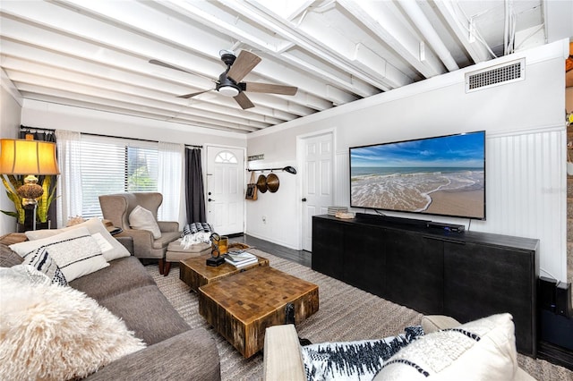 living room featuring ceiling fan and wood-type flooring