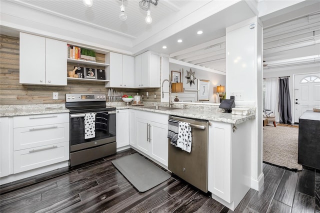 kitchen featuring sink, white cabinets, and appliances with stainless steel finishes