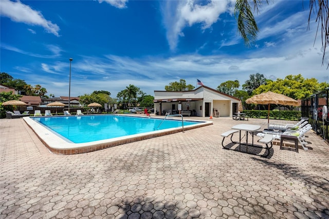 view of pool featuring a patio