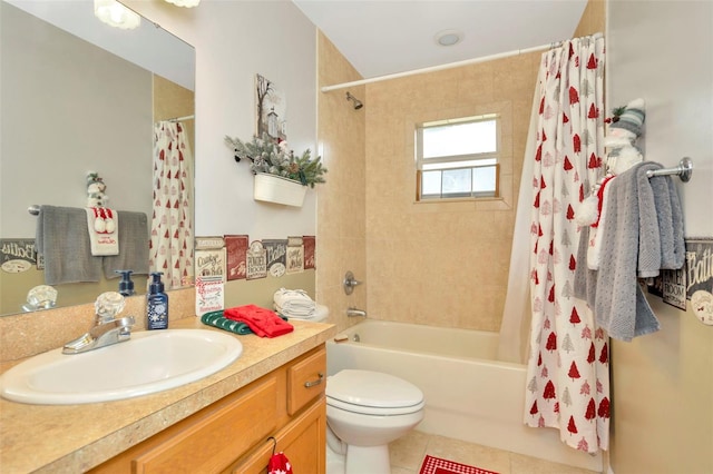 full bathroom featuring tile patterned flooring, vanity, toilet, and shower / bathtub combination with curtain