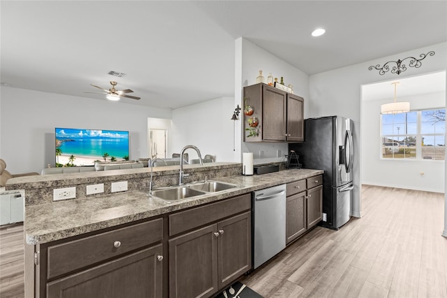 kitchen with sink, light hardwood / wood-style flooring, ceiling fan, appliances with stainless steel finishes, and dark brown cabinetry