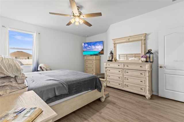 bedroom featuring ceiling fan and wood-type flooring