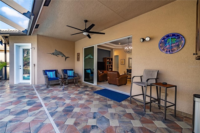 view of patio with ceiling fan