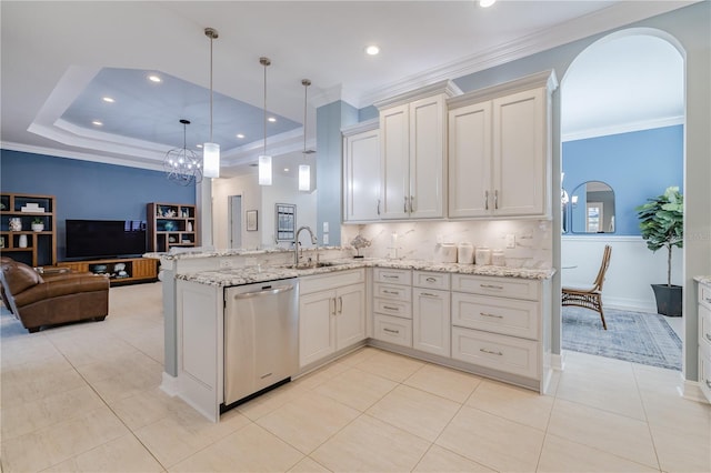 kitchen with dishwasher, kitchen peninsula, sink, and hanging light fixtures