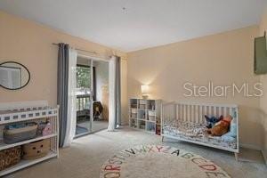 bedroom featuring carpet