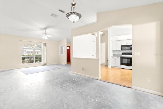 unfurnished living room with ceiling fan