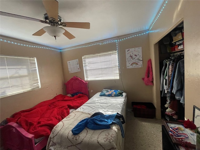 bedroom with a closet and ceiling fan