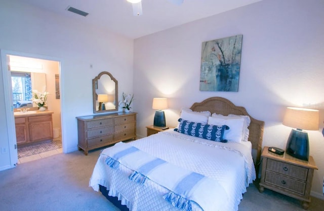 606 Gran Bahama Blvd Unit 29-606, Davenport, FL 33897 - carpeted bedroom with ensuite bathroom and a ceiling fan