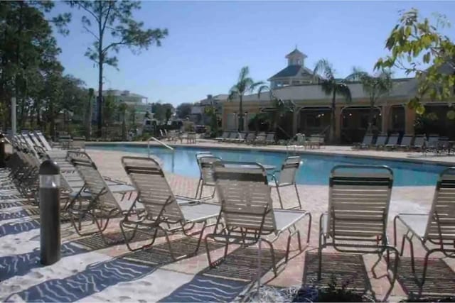 606 Gran Bahama Blvd Unit 29-606, Davenport, FL 33897 - community pool featuring a patio area