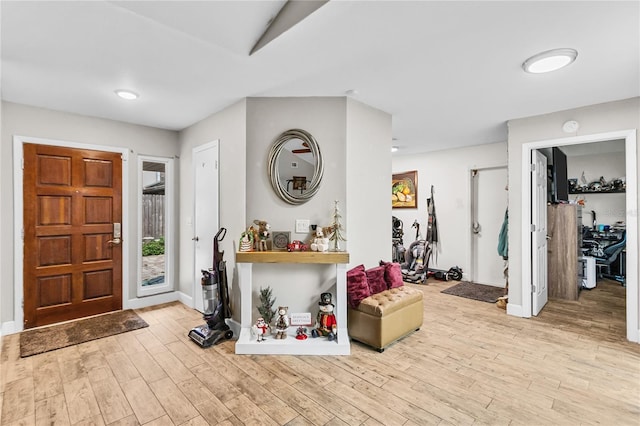 entrance foyer with light hardwood / wood-style flooring