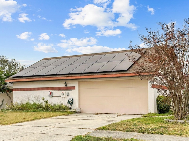 garage with solar panels