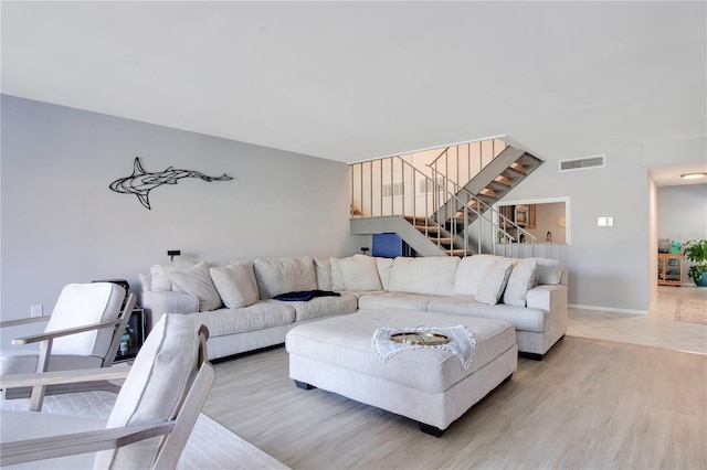 living room featuring wood-type flooring