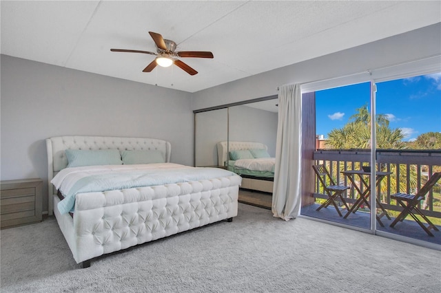 bedroom with access to exterior, ceiling fan, and carpet