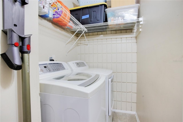 laundry area with washing machine and dryer