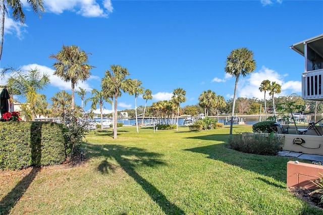 view of yard with a water view