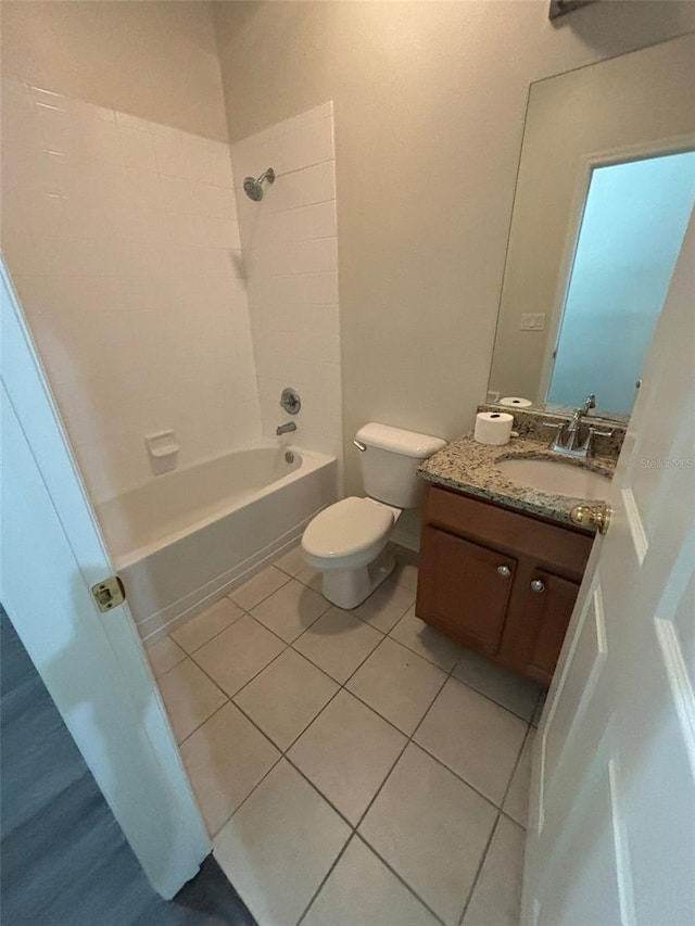 full bathroom featuring tile patterned flooring, vanity, toilet, and tub / shower combination