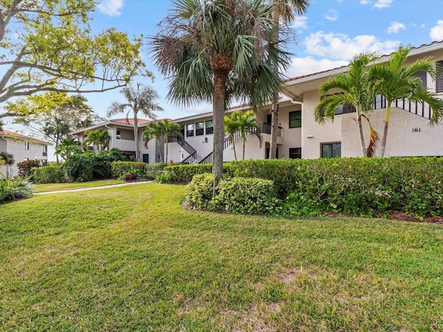 exterior space with a front yard