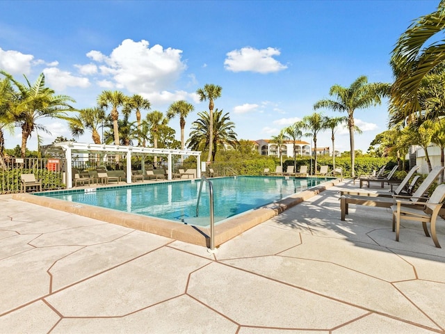 view of pool featuring a patio area