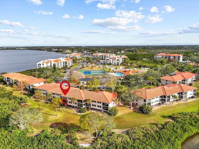 drone / aerial view featuring a water view