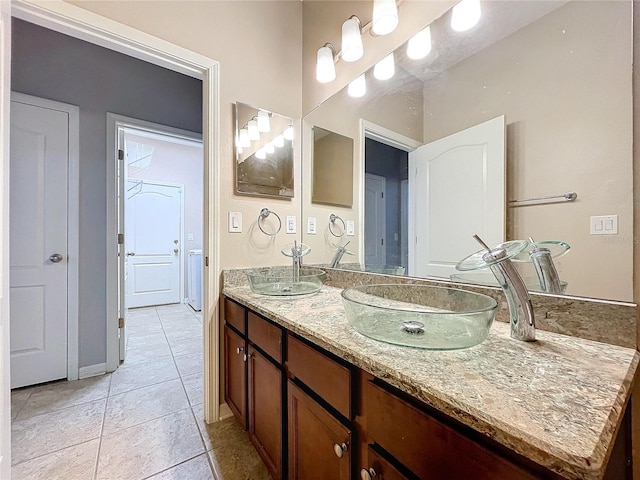 bathroom featuring vanity and tile patterned flooring