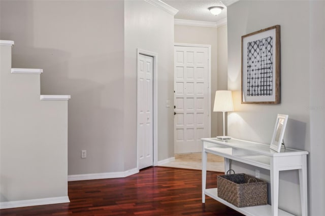 office area with crown molding, dark wood-type flooring, and a textured ceiling