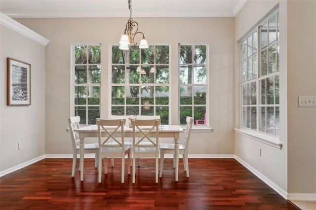 unfurnished dining area featuring ornamental molding, an inviting chandelier, and dark hardwood / wood-style flooring