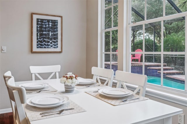 dining area featuring a healthy amount of sunlight