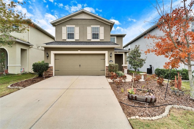 front of property with a garage