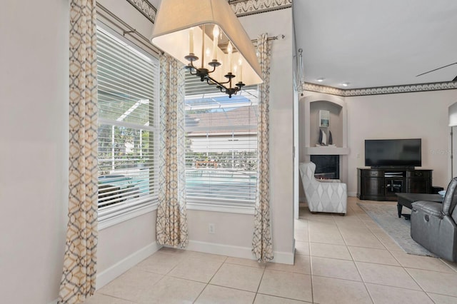 dining space featuring light tile patterned flooring and a chandelier