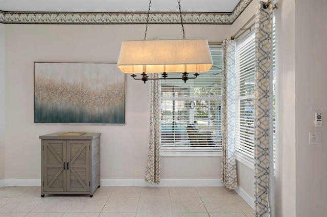 dining area with tile patterned flooring