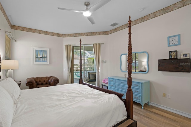 bedroom featuring access to exterior, ceiling fan, and light hardwood / wood-style flooring