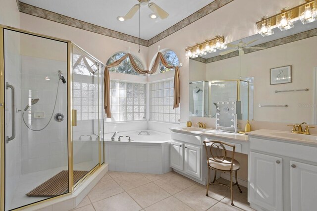 bathroom with independent shower and bath, vanity, tile patterned floors, and ceiling fan