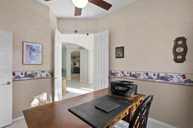 tiled dining room with ceiling fan