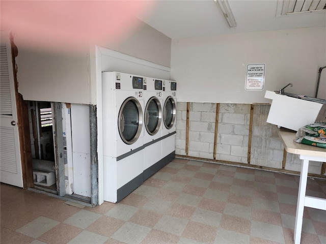 laundry room with washer and dryer